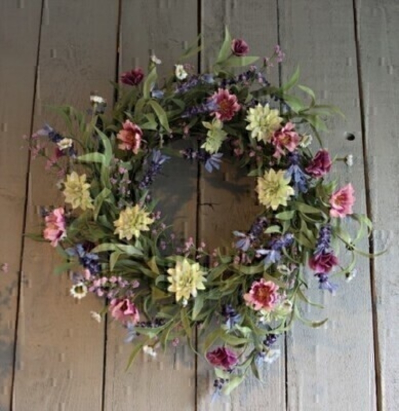 Pink and lilac artificial meadow flowers by Bloomsbury. These stunning silk flowers come pre arranged into a lovely wreath and look hand picked from a meadow especially for you. For realistic artifical and silk flowers Bloomsbury is second to none.